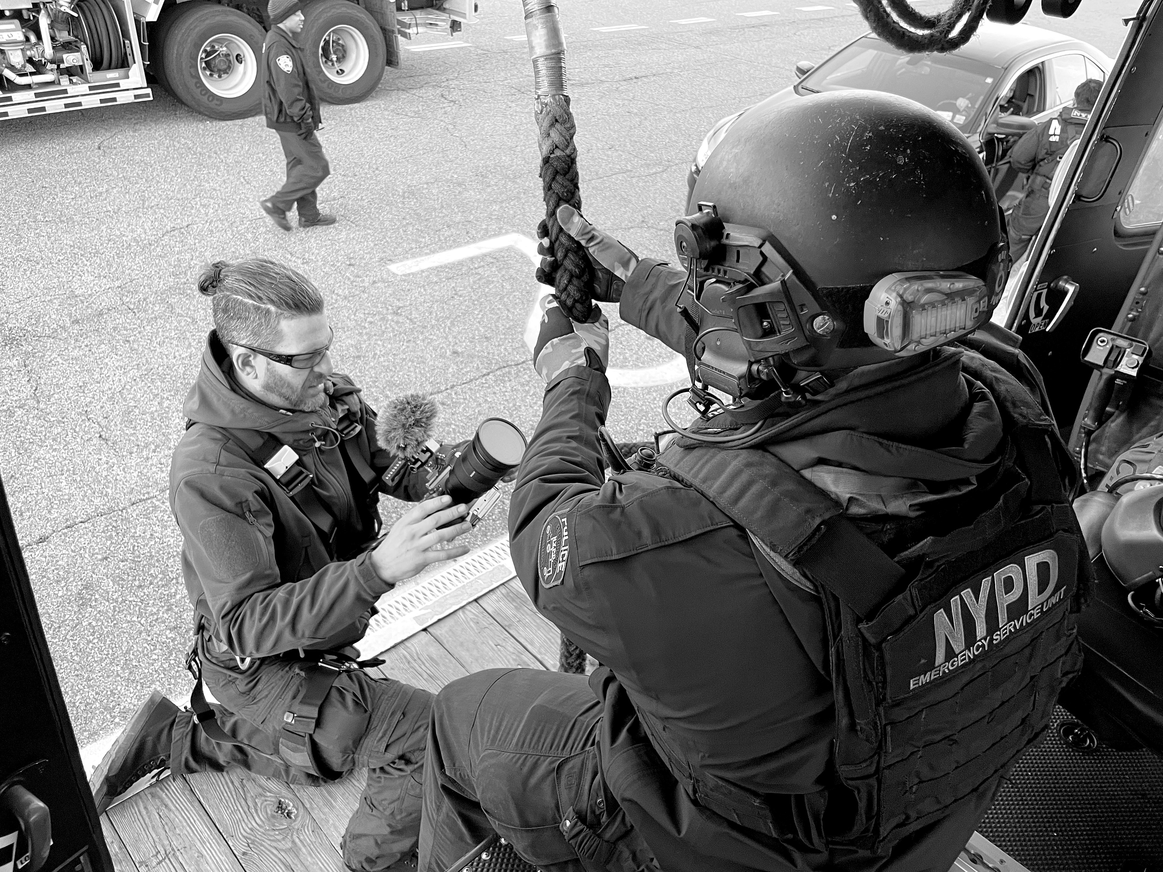 Jeffrey Sussman filming on location with an NYPD Emergency Service Unit officer